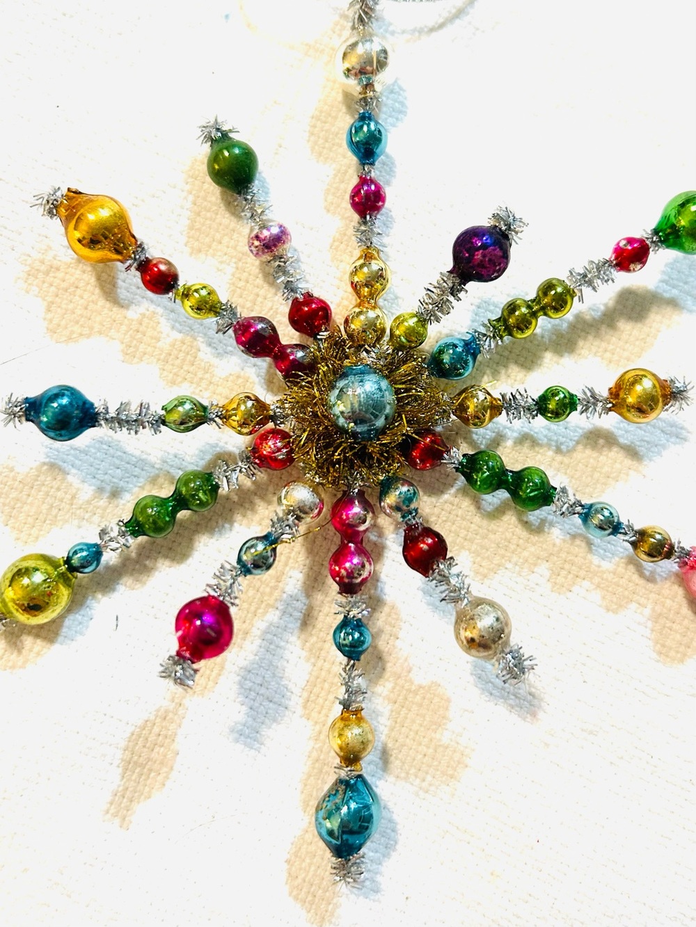Vintage repurposed holiday star burst Christmas Ornament